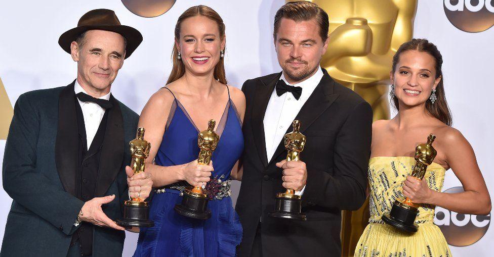 Mark Rylance, best supporting actor winner (Bridge of Spies); Brie Larson, best supporting actress winner (Room); Leonardo DiCaprio, best leading actor winner (The Revenant); and Alicia Vikander, best supporting actress winner (The Danish Girl) pose in the press room during the 88th Annual Academy Awards (2016)