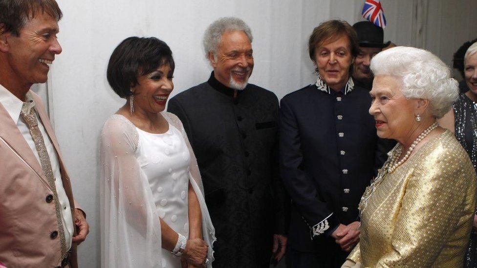 Queen Elizabeth II meets performers (L-R) Sir Cliff Richard, Dame Shirley Bassey, Sir Tom Jones and Sir Paul McCartney backstage after the Diamond Jubilee, Buckingham Palace Concert on June 04, 2012 in London, England. For only the second time in its history the UK celebrates the Diamond Jubilee of a monarch. Her Majesty Queen Elizabeth II celebrates the 60th anniversary of her ascension to the throne.