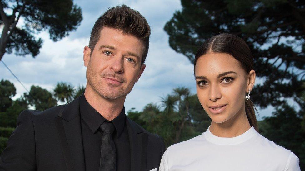 Robin Thicke and April Love Geary