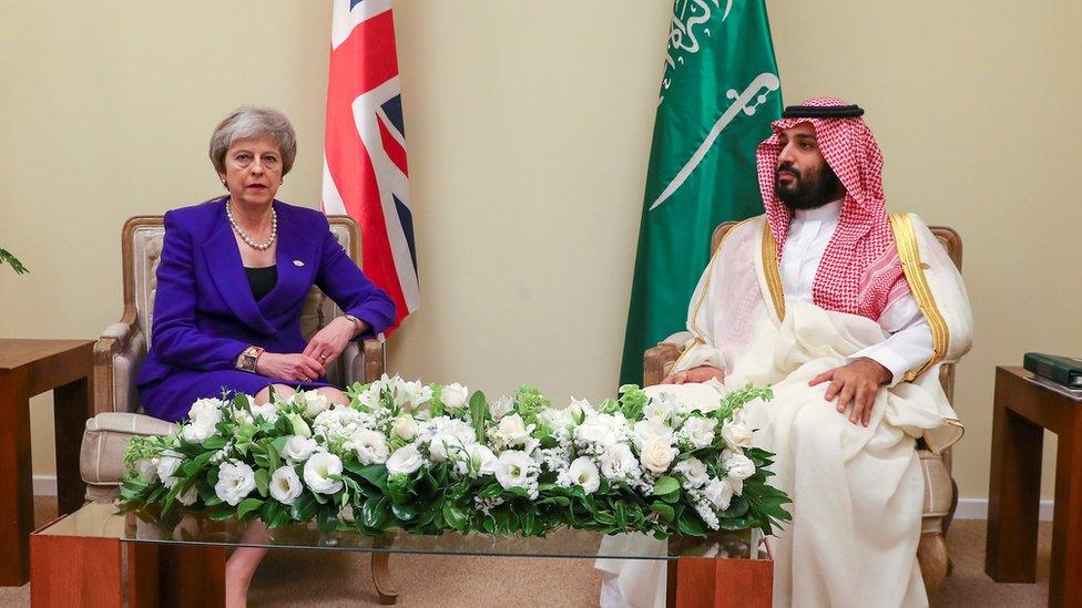 Britain's Prime Minister Theresa May and Saudi Crown Prince Mohammed bin Salman sit together during the Group 20 summit