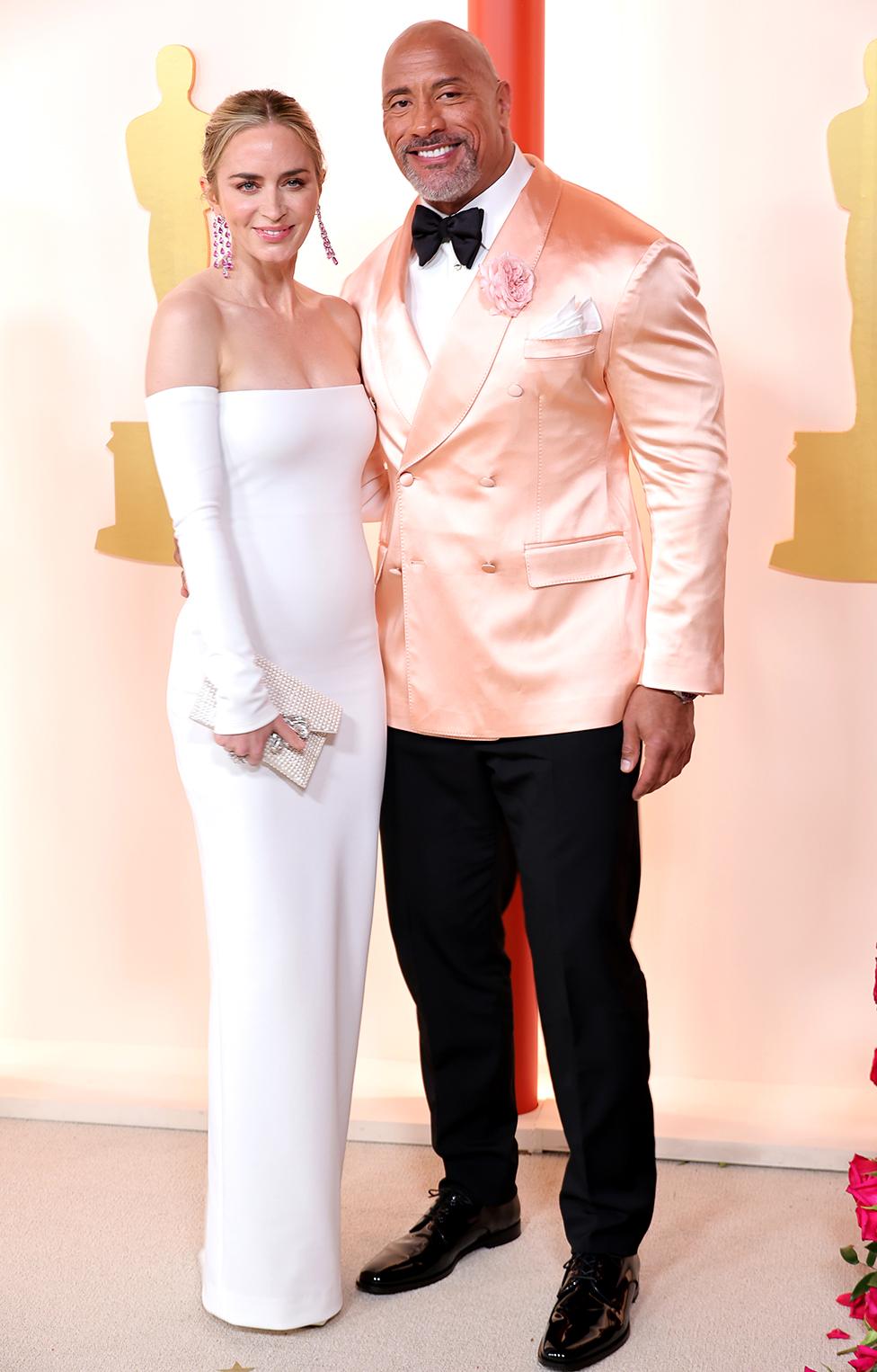 Emily Blunt and Dwayne 'The Rock' Johnson attend the 95th Annual Academy Awards on March 12, 2023 in Hollywood, California