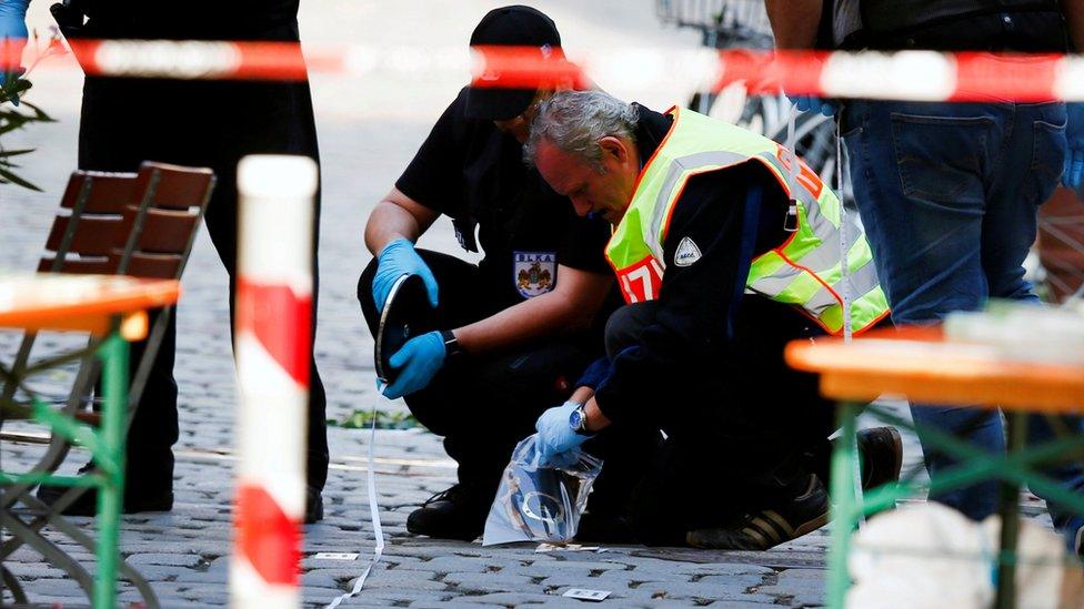 Police secure the area after an explosion in Ansbach, Germany, 25 July 2016