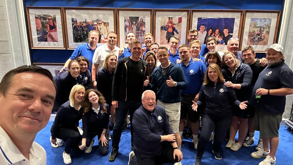 Gareth Quinn with those involved in the European Ryder Cup team's success including team captain Luke Donald