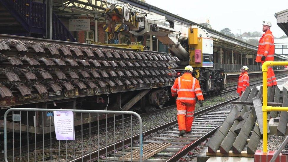 Network Rail employees on the rail line