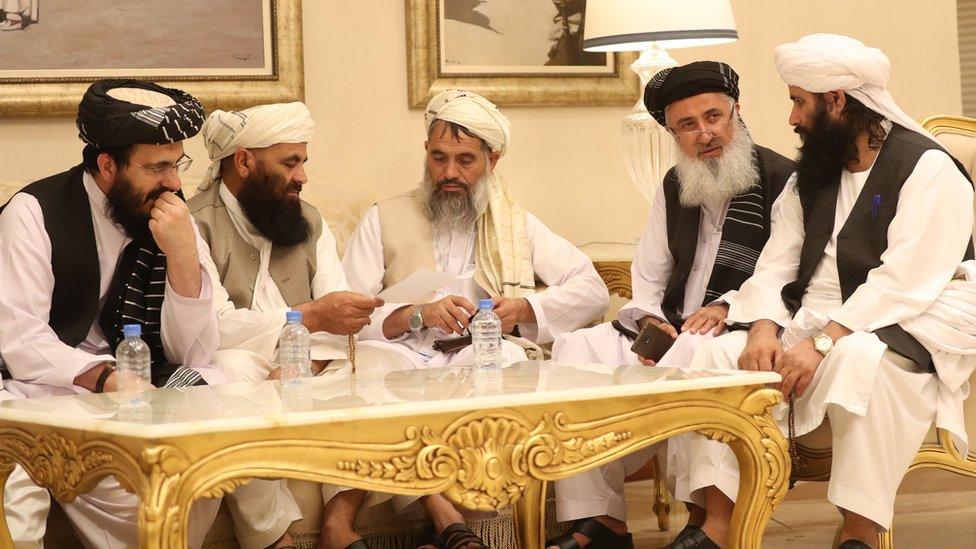 Members of Afghan delegations gather during the second day of the Intra Afghan Dialogue talks in the Qatari capital Doha on July 8, 2019.