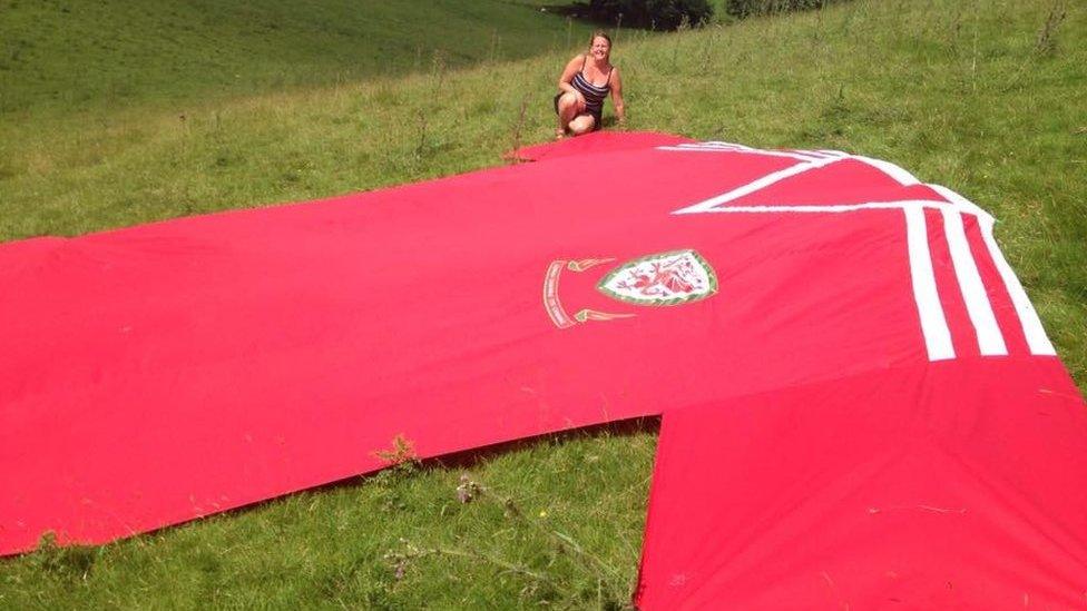 Lynne Humphreys-McCrickett with her giant Wales shirt