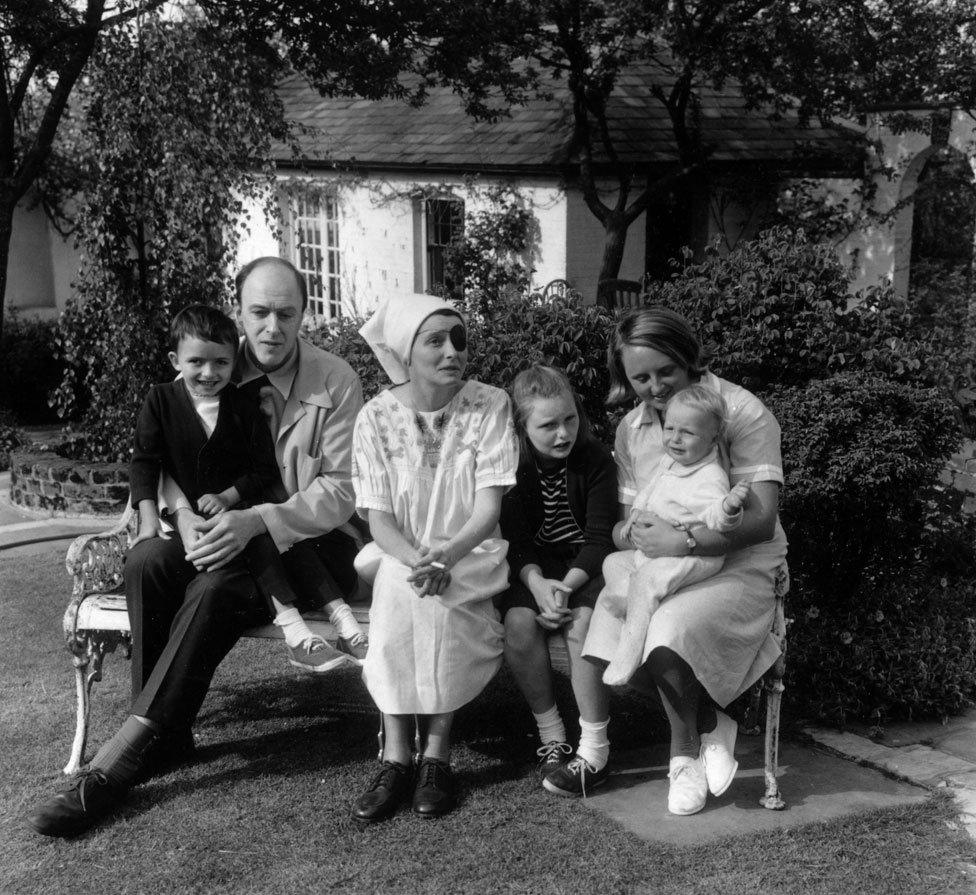 Roald Dahl with his young children in 1965