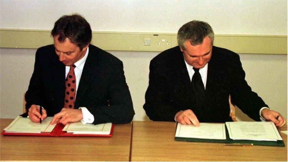 Tony Blair and Bertie Ahern signing the Good Friday Agreement in 1998