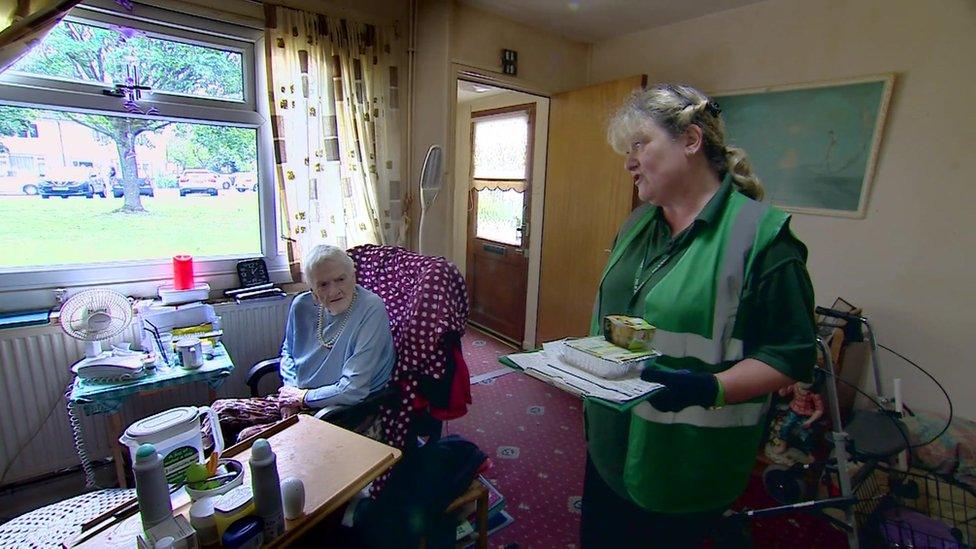 Social care worker with elderly woman