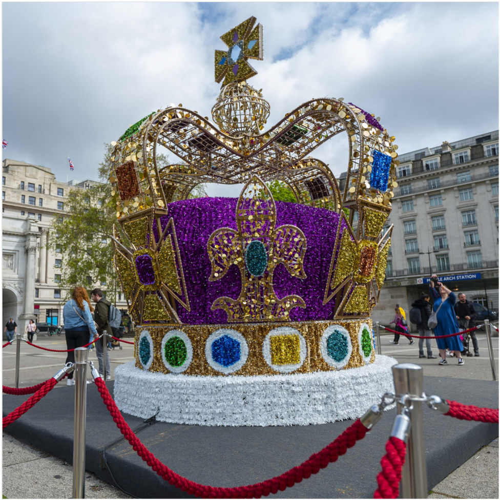 A giant crown statue weighing 300kg, marking the coronation of King Charles III, has been set up by Marble Arch. The statue made out of different coloured glass will be on display until 11 May.