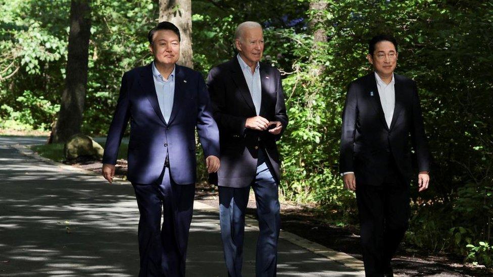 the three leaders at Camp David