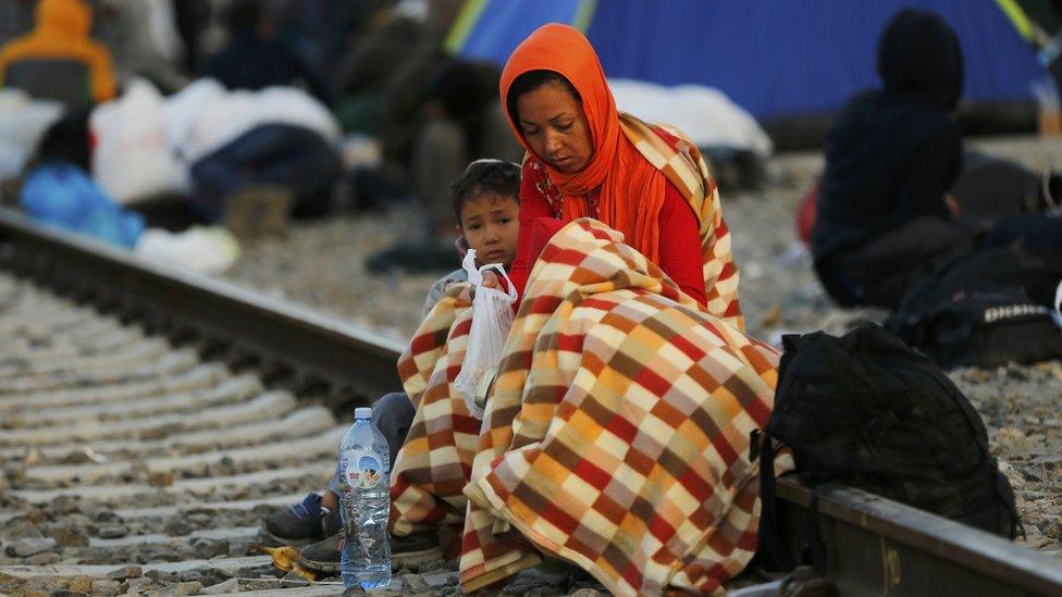 Woman and child on the tracks near Tovarnik, Croatia - 19 September