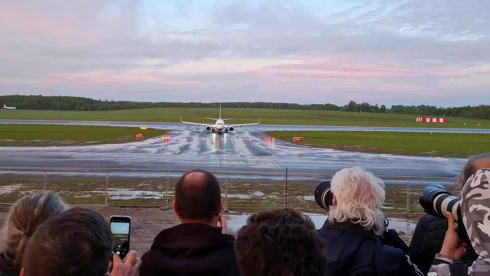 A Ryanair aircraft, which was carrying Belarusian opposition blogger and activist Roman Protasevich and diverted to Belarus, where authorities detained him, lands at Vilnius Airport in Vilnius, Lithuania