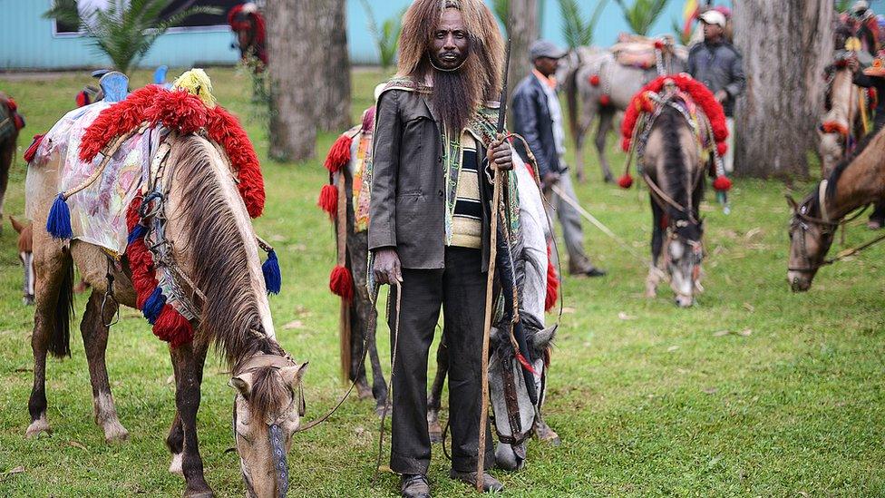 An Ethiopian wearing traditional Oromo costume is pictured at the Prime Minister's Palace as he pays his respects in Addis Ababa on August 31, 2012. Ethiopian Prime Minister Meles Zenawi