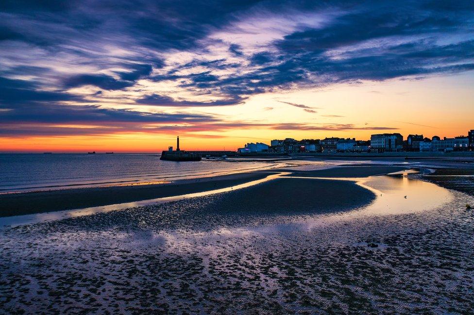 A beach at dawn