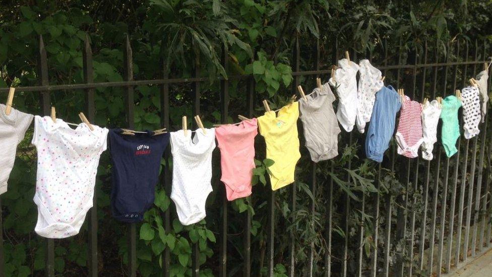 baby's clothes on a washing line