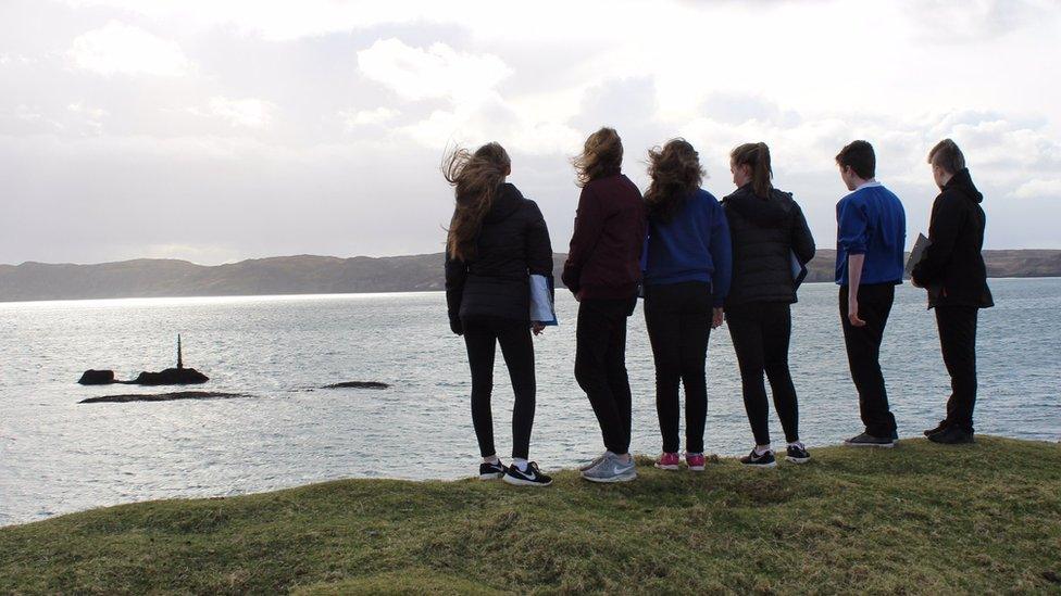 School pupils look out to the site of the Iolaire Disaster