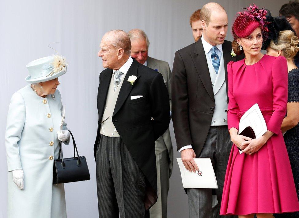 Queen Elizabeth, Prince Philip, Prince William and Kate, Duchess of Cambridge wait for the arrival by open carriage of Princess Eugenie