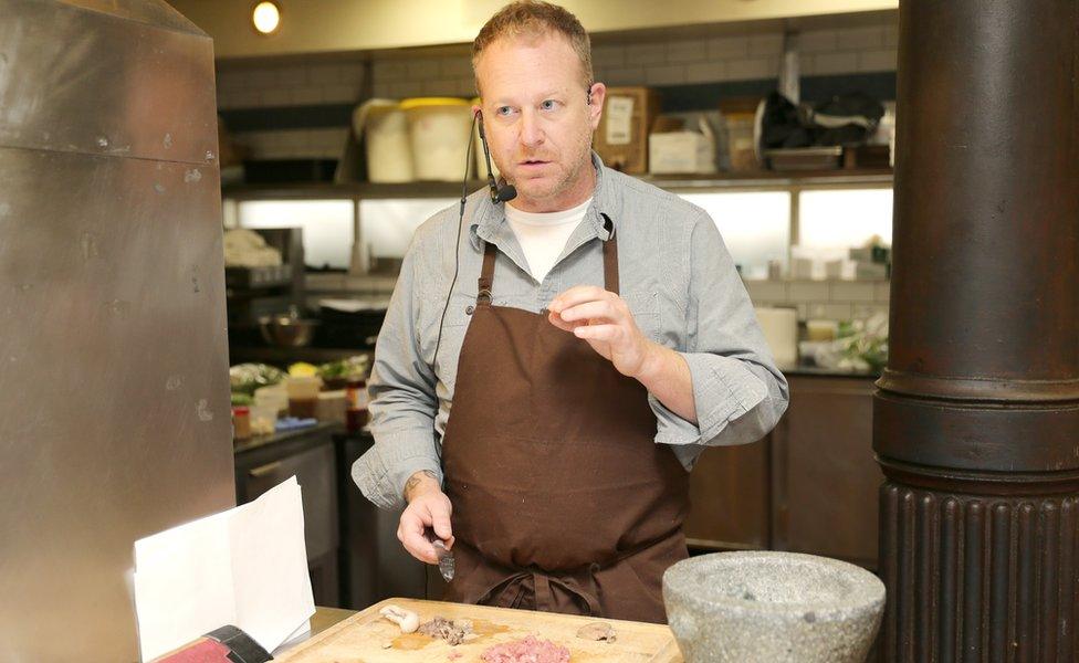 Andy Ricker of Pok Pok, Whiskey Soda Lounge prepares Som Tam Lao; Som Tam Thai Laap Pet Isaan; Khao Niaw Tom Saep Muu in Modern Thai class during Day 1 of the New York Culinary Experience 2014 presented by New York Magazine and the International Culinary Center at International Culinary Center on April 5, 2014 in New York City.