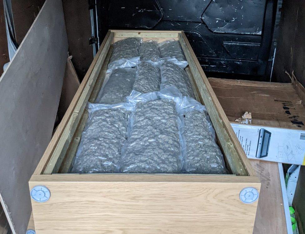 Bags of cannabis hidden inside a wardrobe inside a van