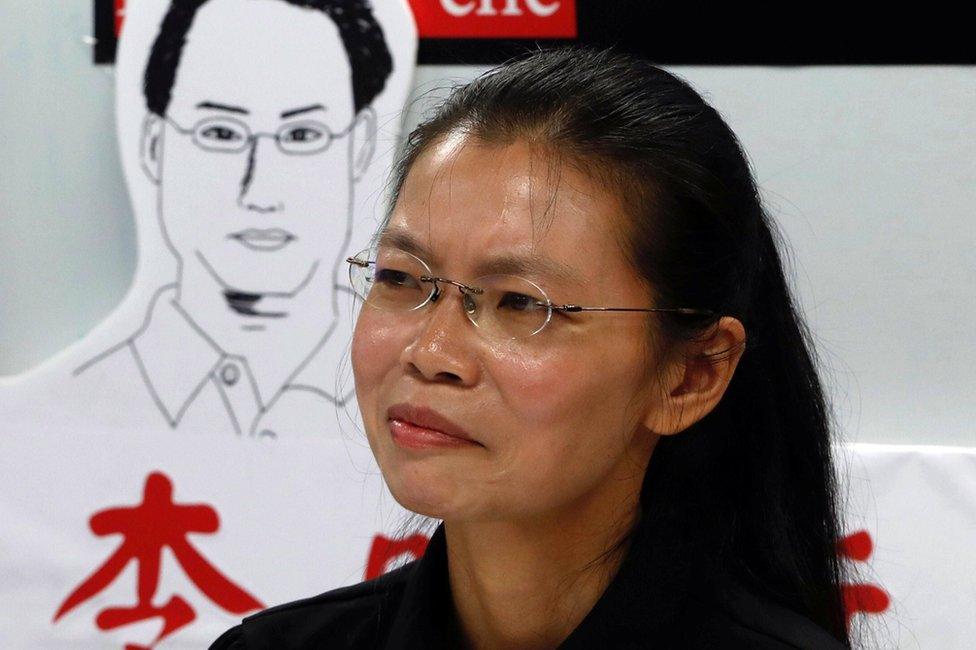 Lee Ching-yu, wife of Taiwan human rights advocate Lee Ming-che, who has been detained in China, speaks to the media a day before departing for her husband's trial, in Taipei, Taiwan 9 September 2017.