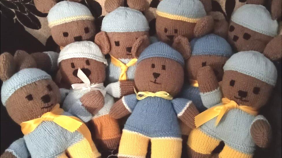 A group of knitted bears