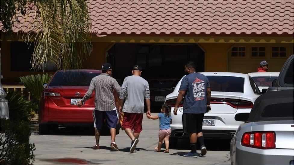 Victims relatives arrive at the house on Breckinridge Road