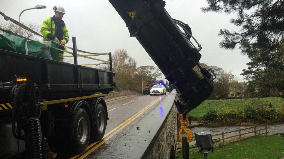 NRW staff working on flood defences in St Asaph