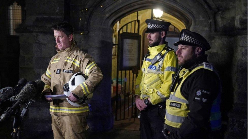 Andy Cole (left) from Dorset Wiltshire Fire and Rescue speaks to the media near the scene of a crash involving two trains