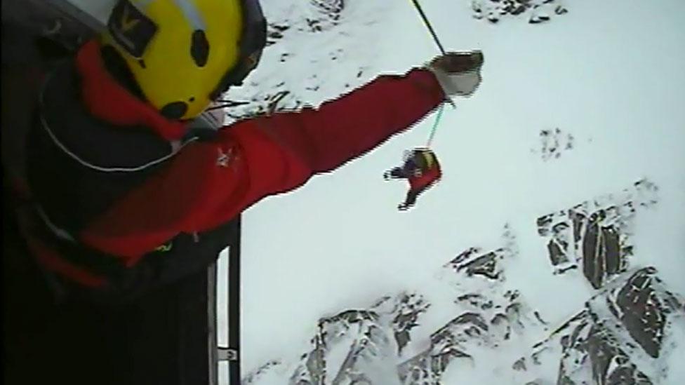 Ben being winched from ledge to the Coastguard helicopter