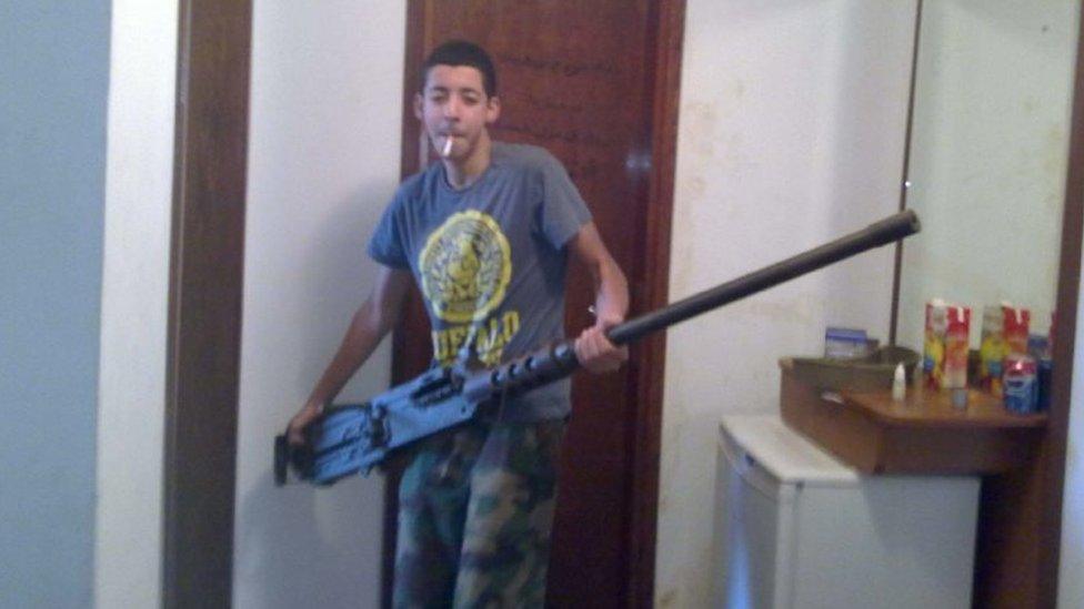 Salman Abedi holding a large gun