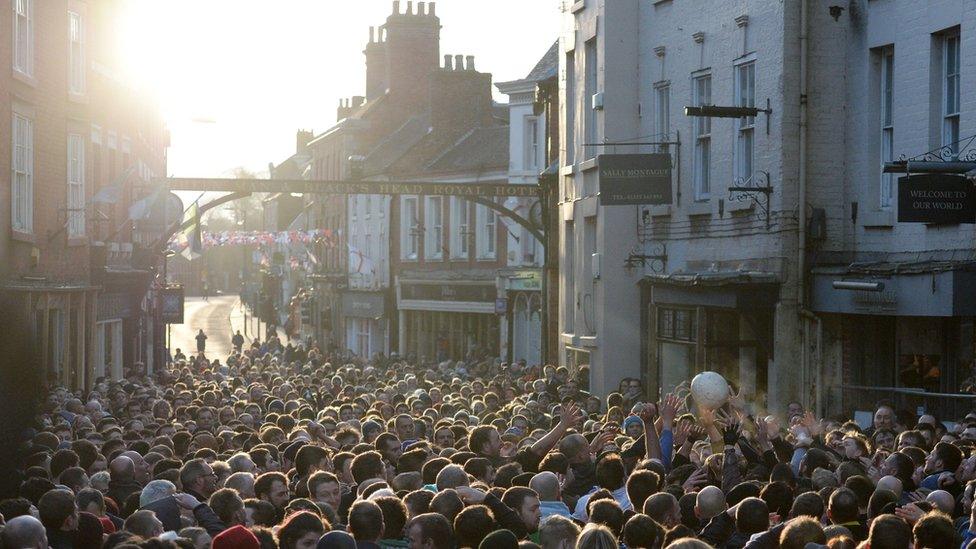 Players in Ashbourne High Street