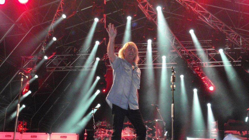 Rick Parfitt on stage at Holkham Hall in 2014