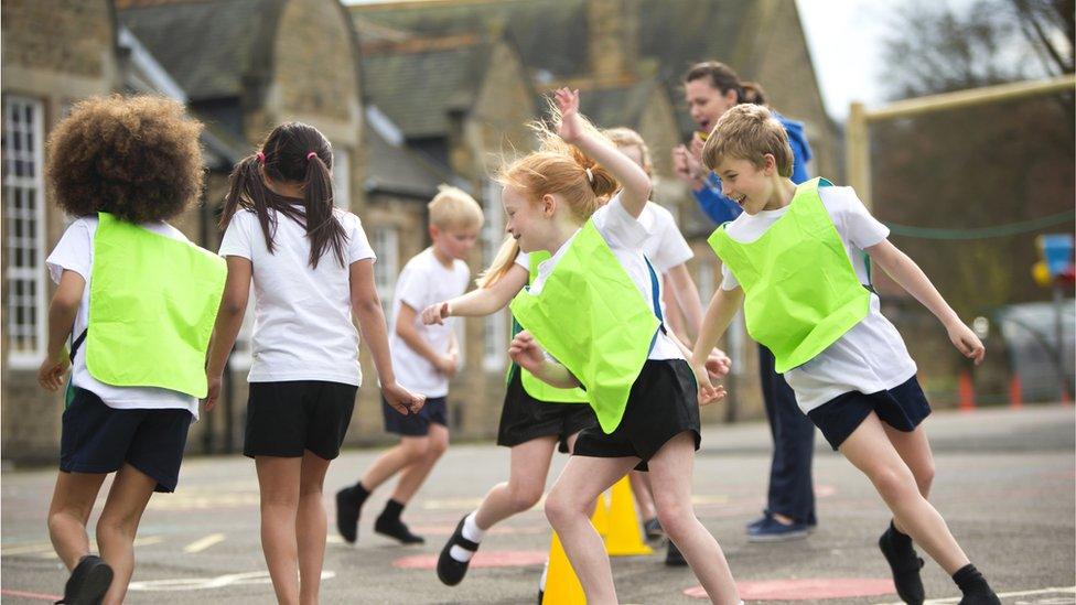 children playing in playground