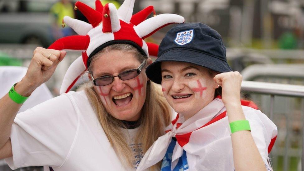 Fans in Manchester watch the Euro 2020 semi final match between England and Denmark.