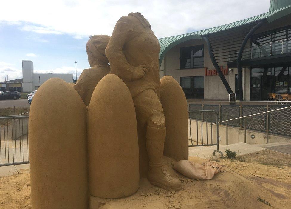 Damaged sand sculpture