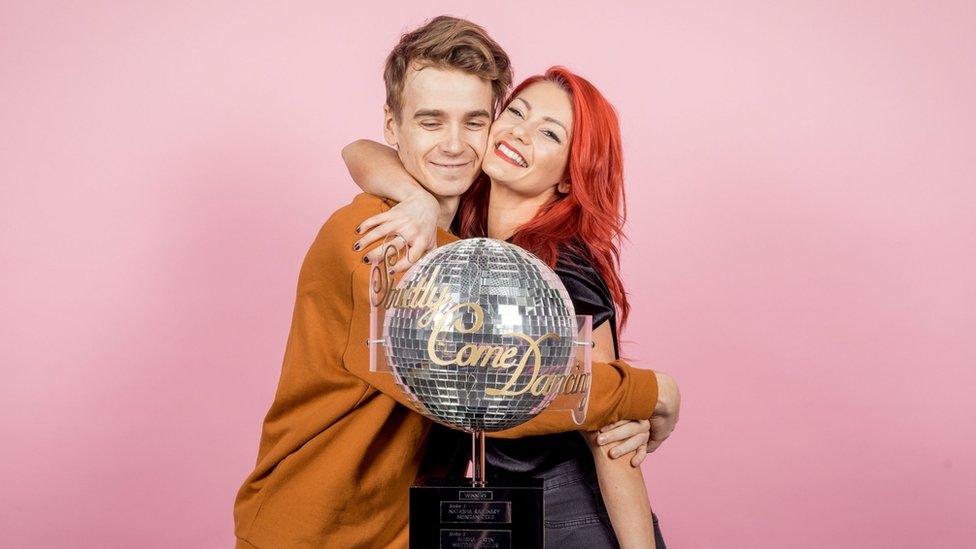 BBC handout photo of finalists Joe Sugg and Dianne Buswell with the Strictly Come Dancing glitterball trophy.