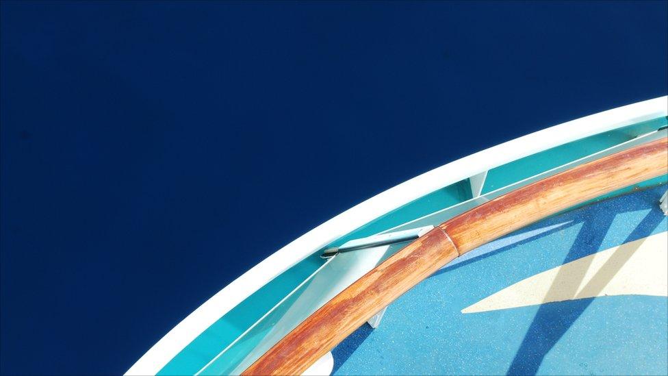 Looking over the side of a ship