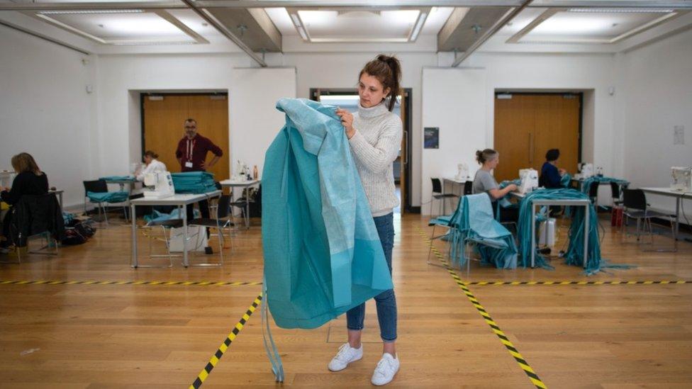 Volunteers producing surgical gowns at the Fashion School