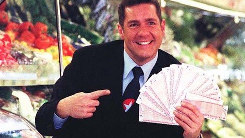 Dale Winton doing a "Supermarket Sweep" in 1997 to promote the National Lottery