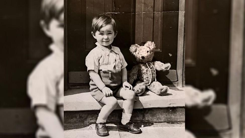 John pictured as a little boy