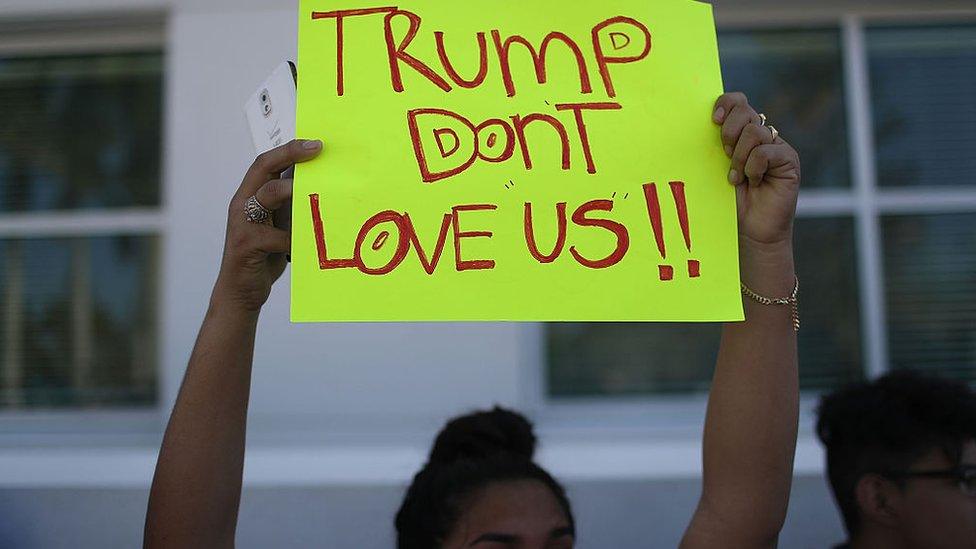 A Florida high school student shows her dissatisfaction during a school walk-out protest