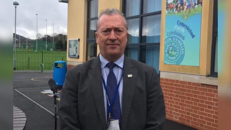 Headteacher Lynn Griffiths smiles outside Ysgol Gynradd Gymraeg School