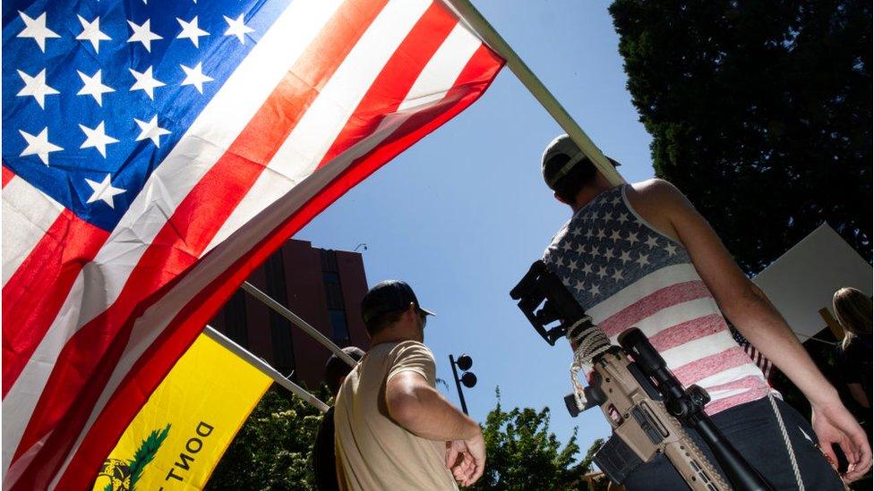 Armed individual at anti-mask rally in Washington state