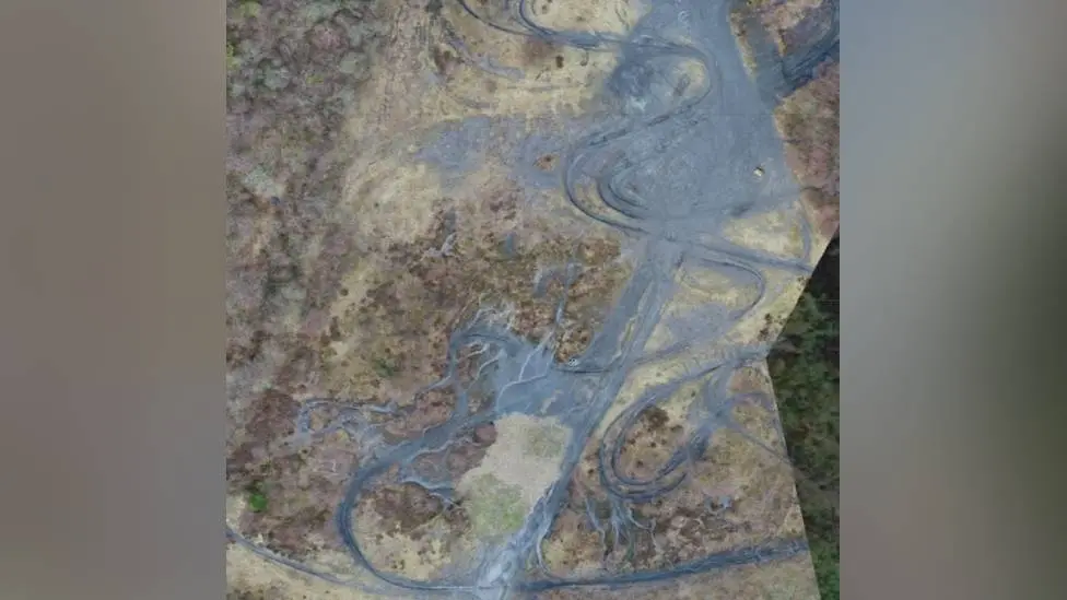 An aerial photo provided by South Wales Police showing motorbike tracks across a coal tip in Rhondda Cynon Taf.