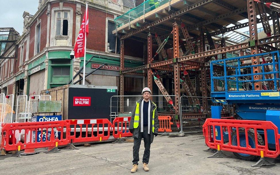 Alec Shaw outside the Cocoa Store building