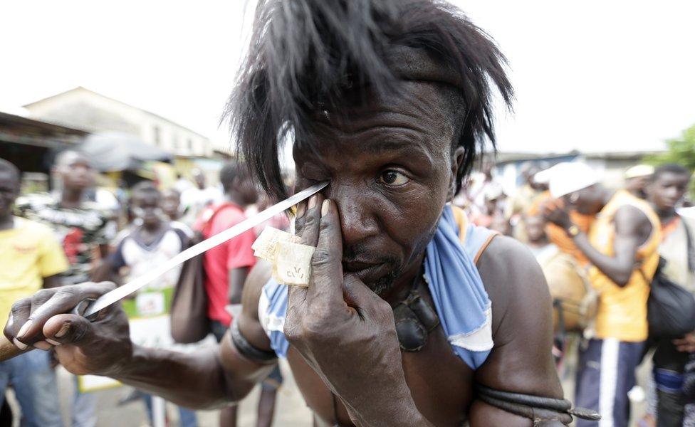 Ivoriens take part in a parade on the last day of the 36th Popo Carnival in Bonoua, 60km south of Abidjan, Ivory Coast, 29 April 2017 . The carnival of Bonoua is the Ivoirians version of Mardi Gras running for a week and is one of the most well attended events in the Ivory Coast. Derived from at first a celebration of the cultural heritage of the Aboure people, the Popo Carnival involves gastronomic competitions, Miss pageants, sports days, a festival of traditional dances and reflection workshops on Popo museum amongst other activities.