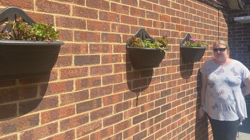 Tracey Stubbings with her flower planters