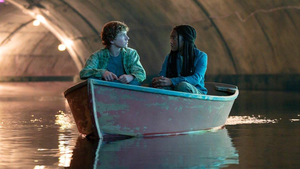 Percy and Annabeth in a boat