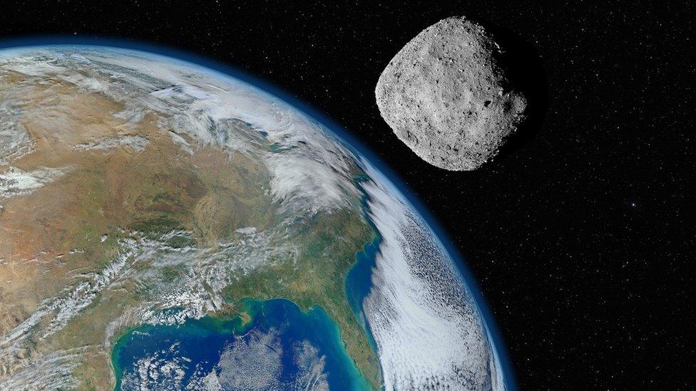 An artists impression of an asteroid near Earth